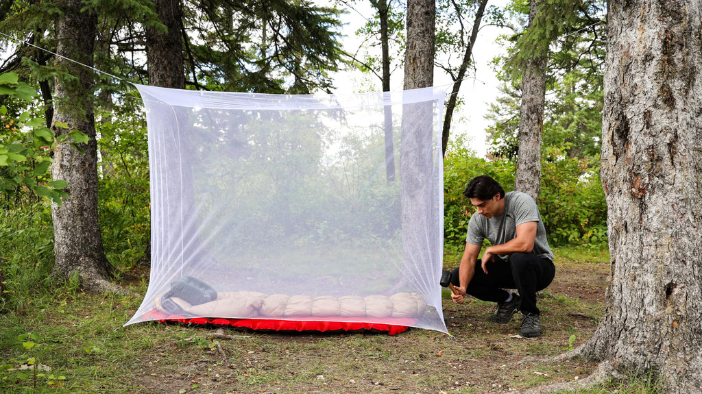 Coghlan's Rectangular Mosquito Net – Lightweight Mesh Canopy for Camping, Travel, and Outdoor Use – Includes Tie Loops, Carry Bag, Twine, Hooks, Anchors, Nails – White, 78" x 32" x 59"