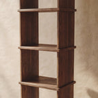 Tall narrow bookcase in walnut