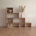 Step bookshelf in white oak