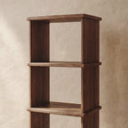 Tall narrow bookcase in walnut