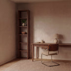 Tall narrow bookcase in walnut